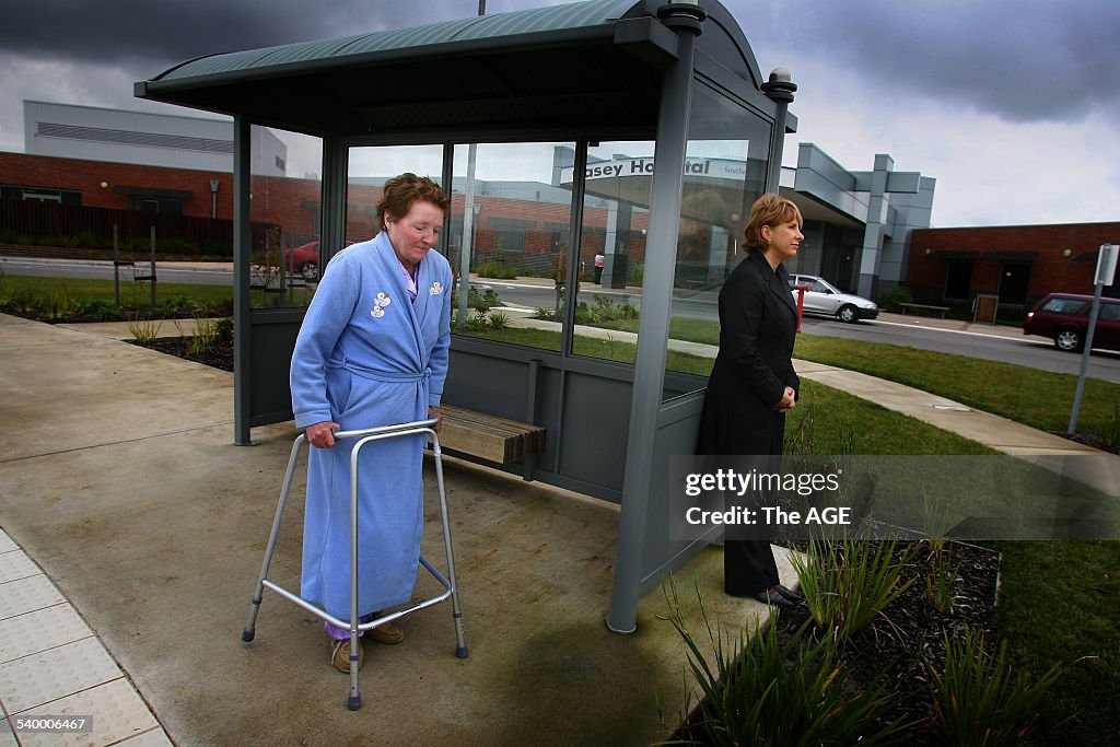 Cr Lorraine Wreford (right), and patient, Mary, at the bus stop outside the Case