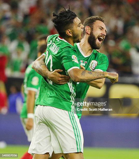 Jesus Manuel Corona of Mexico celebrates a second half goal with his teammate Miguel Layun during the 2016 Copa America Centenario Group match...