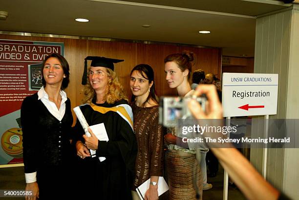 Annita Keating, who graduated from The University of New South Wales with a Masters' Degree in Arts is pictured with her daughters, from left,...