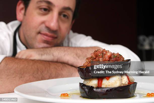 Chef Peter Conistis, from the Omega restaurant with his moussaka, 30 March 2006. SMH Picture by LEE BESFORD