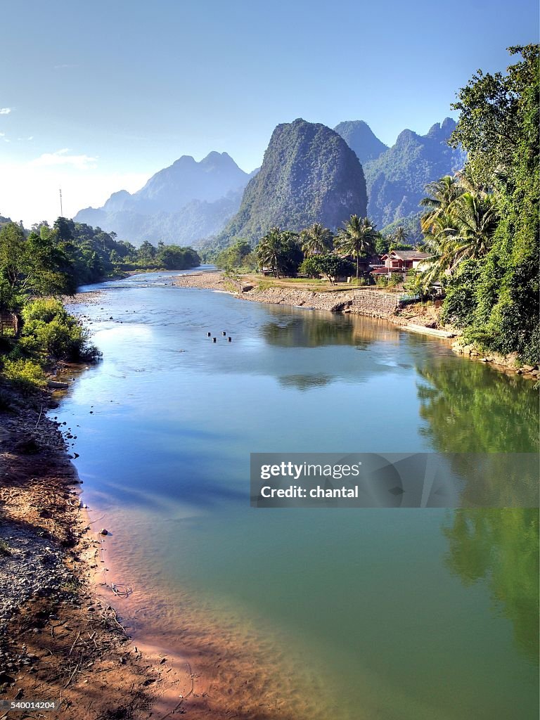 Surreal landscape by the Song river at Vang Vieng