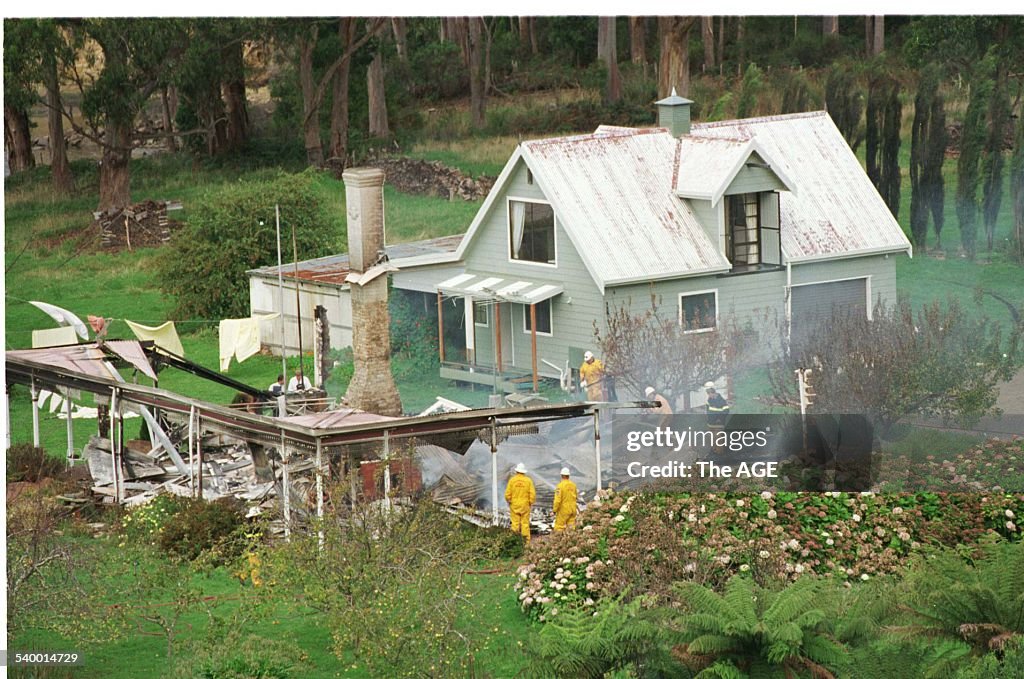 Emergency services personnel in the ruins of the Seascape Guesthouse where gunma