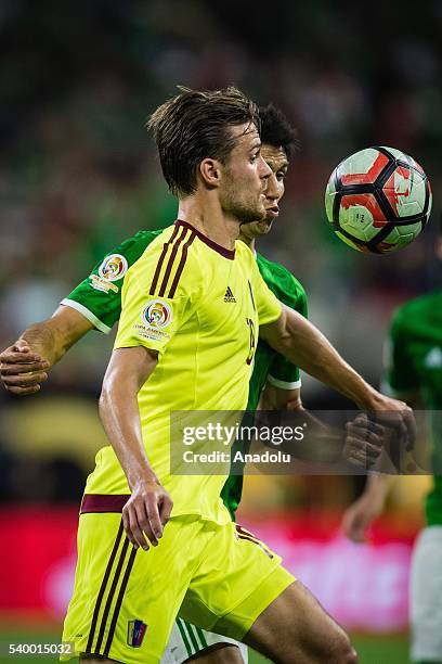 Jesus Molina of Mexico struggle for the ball against Christian Santos of Venezuela during the 2016 Copa America Centenario Group C match between...