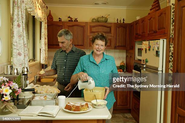 Home cook hero, Faye Keith with husband Jim in their Mt. Colah kitchen. Faye has never had a standard mixing bowl, preferring to use ice cream...