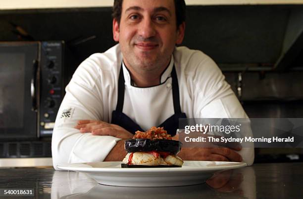 Chef Peter Conistis, from the Omega restaurant, with his moussaka, 30 March 2006. SMH Picture by LEE BESFORD