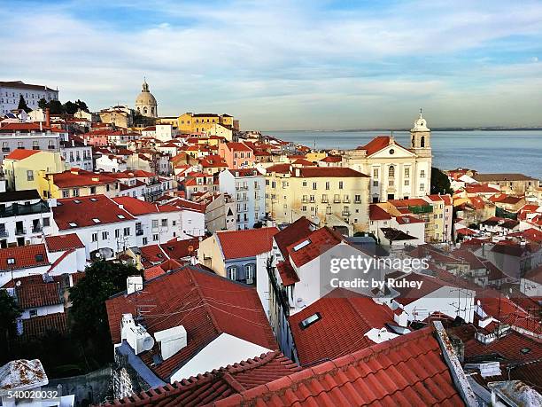 the colors of lisbon at sunset - graca church stock pictures, royalty-free photos & images