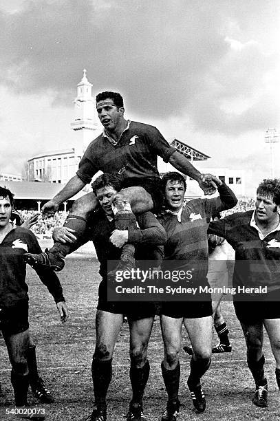 Rugby League Grand Final 1970. A victorious South Sydney captain John Sattler is chaired off the field by teammates after playing the entire 80...