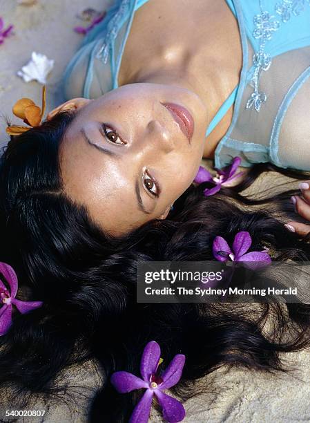 Performer Natalie Mendoza at the beach, 25 June 2001. SMH Picture by STEPHEN BACCON