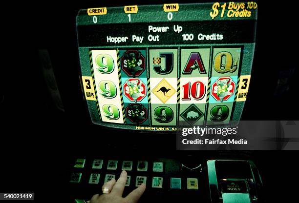 Poker machine in a Sydney club, 26 June 2001. AFR Picture by MICHEL O'SULLIVAN