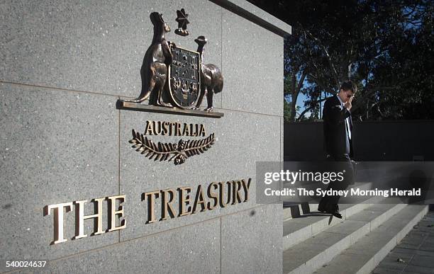 The Australian coat of arms on a wall outside the the Department of Treasury, Canberra, 19 November 2001. SMH Picture by JACKY GHOSSEIN