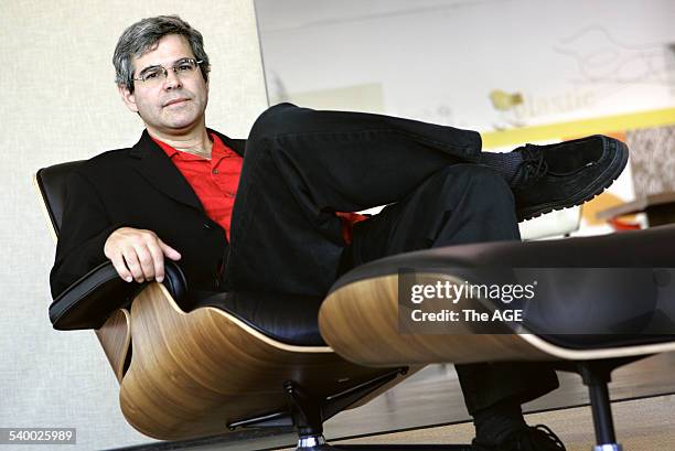 Living Edge showroom, Richmond. Dimitros Eames, Grandson of the famous design couple, seated in the famous Eames chair whose design is now 50 years...