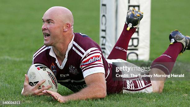 Manly's Ben Kennedy dives over the line for a try during the NRL Round 7 match between the Manly Sea Eagles and Canterbury Bulldogs, 23 April 2006....