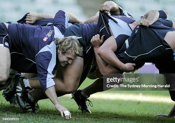 The NSW Waratahs having a training session at Aussie Stadium. Rocky Elsom packs into scrum, 12 April 2006. SMH Picture by CRAIG GOLDING