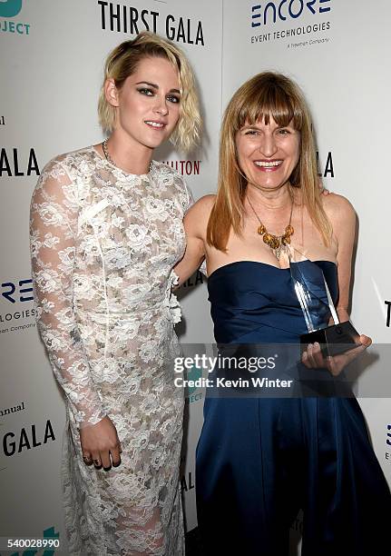 Actress Kristen Stewart and director/honoree Catherine Hardwicke pose backstage at the 7th Annual Thirst Gala at the Beverly Hilton Hotel on June 13,...