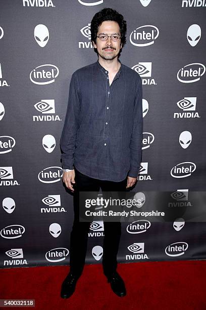 Actor Geoffrey Arend checks out the latest virtual reality and gaming technology at a VIP Alienware Party during E3, in partnership with NVIDIA and...