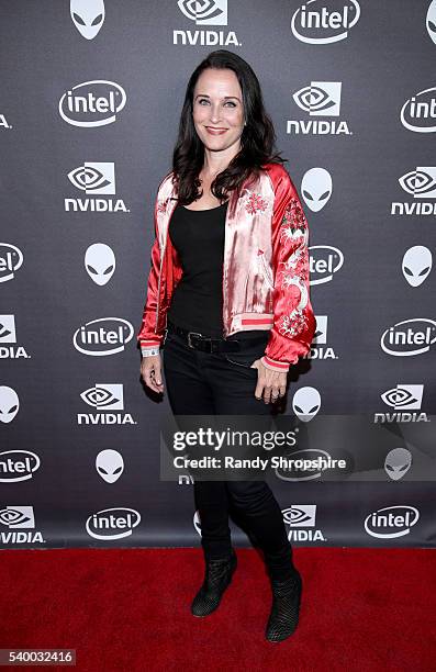 Actress Courtenay Taylor checks out the latest virtual reality and gaming technology at a VIP Alienware Party during E3, in partnership with NVIDIA...