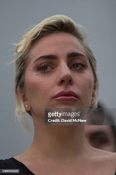 Singer Lady Gaga weeps after reading some of the names of the dead at a vigil for the worst mass shooing in United States history on June 13, 2016 in...