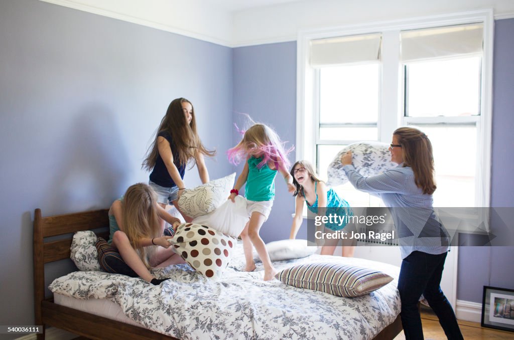 Pillow fight with mother and 4 daughters