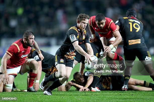 Brad Weber of the Chiefs kicks forward during the International Test match between the Chiefs and Wales at Waikato Stadium on June 14, 2016 in...