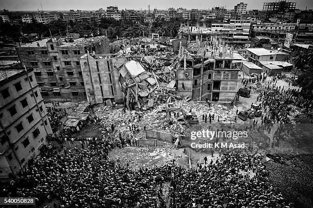 Rescue workers take part in the rescue of the eight-storey building Rana Plaza which collapsed at Savar Dhaka, Bangladesh April 25, 2013.