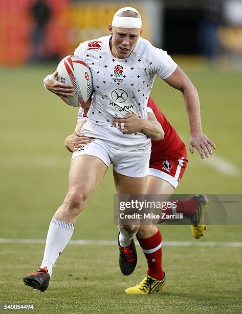 Heather Fisher of England runs with the ball during the match against Canada at Fifth Third Bank Stadium on April 9, 2016 in Kennesaw, Georgia.