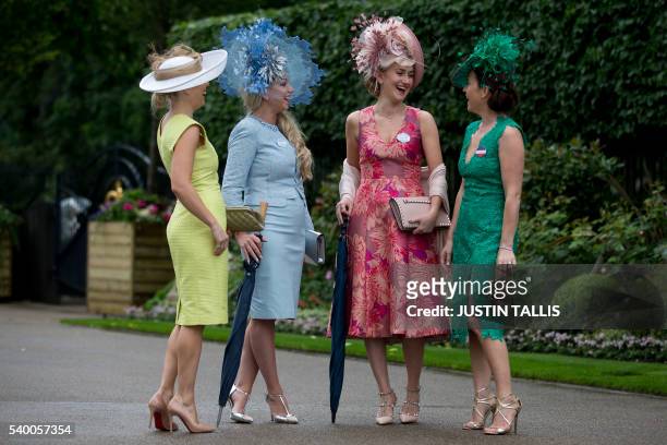 Racegoers arrive on the first day on the first day of the Royal Ascot horse racing meet, in Ascot, west of London, on June 14, 2016.