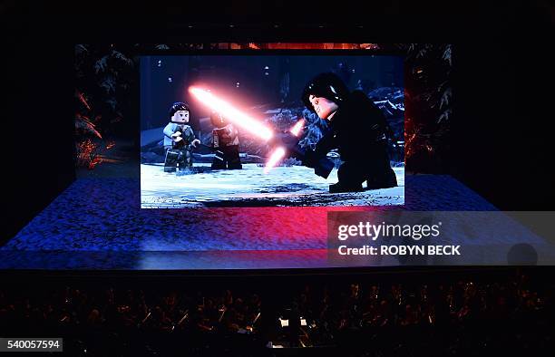 The crowd watches a trailer for the new "Lego Star Wars: The Force Awakens" at the Sony Playstation event at the Shrine Auditorium in Los Angeles,...