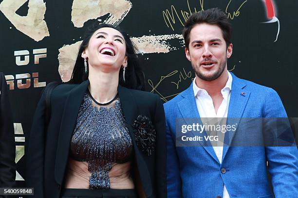 Actress Cecilia Cheung Pak-Chi and American actor Michael Trevino attend the press conference of film "Out of Control" during the 19th Shanghai...