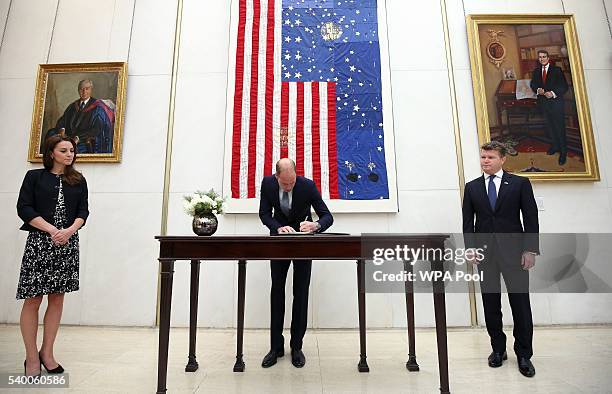 Prince WIlliam, The Duke of Cambridge signs a book of condolence for the Orlando mass shooting victims while Catherine, Duchess of Cambridge and...