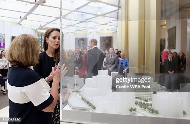 Catherine, The Duchess of Cambridge chats with Elizabeth Dibble, deputy chief of mission, as they look at a model of the new US Embassy which will be...