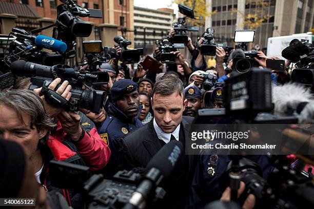 Oscar Pistorius leaves the North Gauteng High Court on June 14, 2016 in Pretoria, South Africa. Having had his conviction upgraded to murder in...