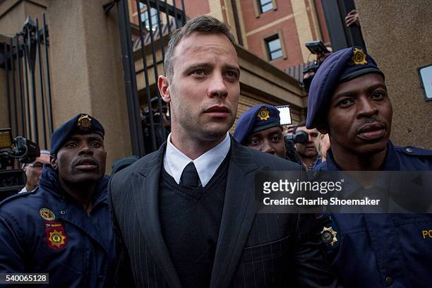 Oscar Pistorius leaves the North Gauteng High Court on June 14, 2016 in Pretoria, South Africa. Having had his conviction upgraded to murder in...