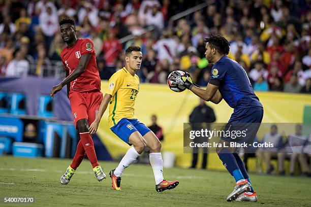 Peru national team goalkeeper Pedro Gallese stops the advance by Brazil player Philippe Coutinho during the Soccer, 2016 Copa America Centenario...