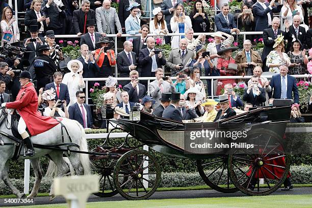 Prince Harry, Prince Andrew, Duke of York, Queen Elizabeth II and Prince Philip, Duke of Edinburgh arrive by carriage on day 1 of Royal Ascot at...