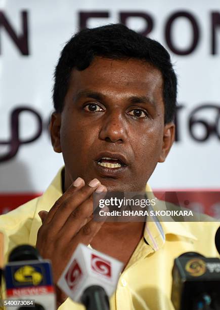 Sri Lankan head of the Anti-Corruption Front Keerthi Tennakoon addresses reporters in Colombo on June 14 demanding the sacking of controversial...