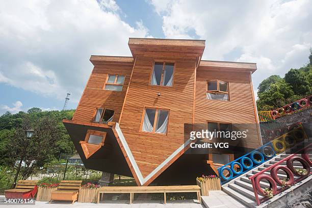 The villa stands upside down at Yantou village on June 14, 2016 in Ningbo, Zhejiang Province of China. The upside-down villa covered an area of over...