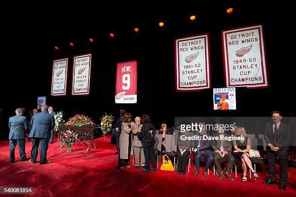 Felix Gatt is comforted by Cathy Howe and family during the Gordie Howe Visitation at Joe Louis Arena on June 14, 2016 in Detroit, Michigan. Howe,...
