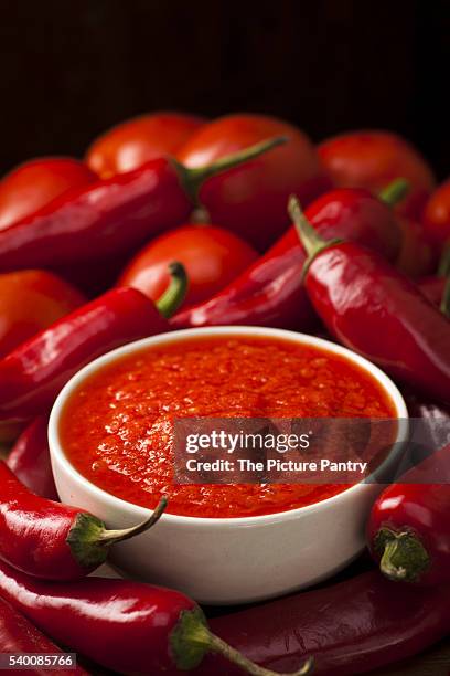 red tomato and chili sauce - red pepper stock pictures, royalty-free photos & images