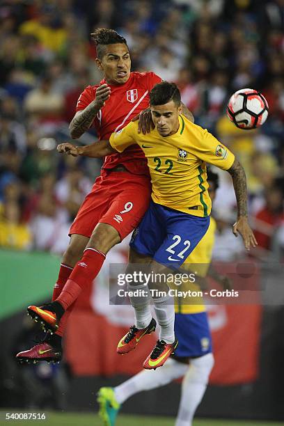 Jose Paolo Guerrero of Peru and Philippe Coutinho of Brazil cha;;edge for the ball during the Brazil Vs Peru Group B match of the Copa America...