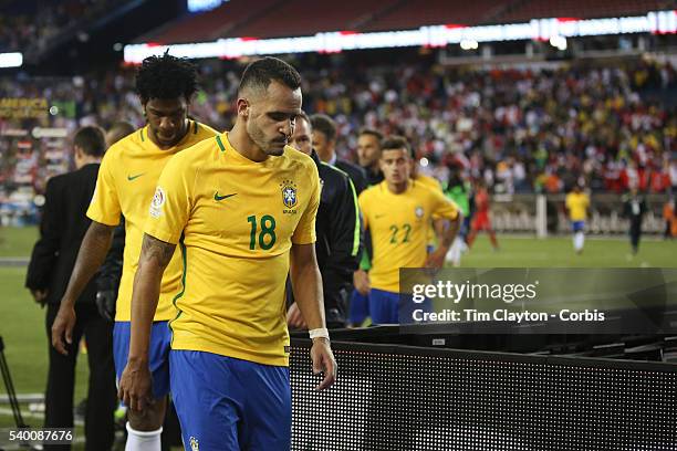 Renato Augusto of Brazil and other players leave the field after their 1-0 loss during the Brazil Vs Peru Group B match of the Copa America...