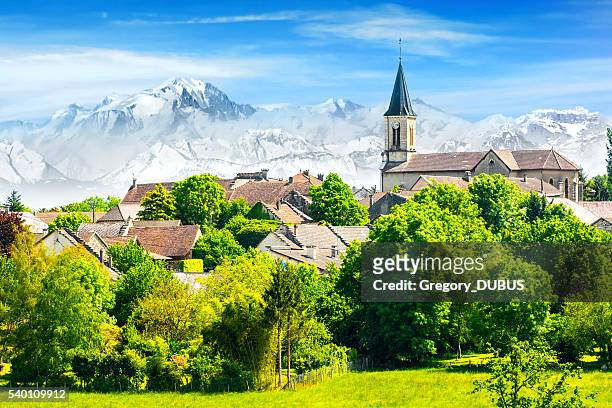 old french village in countryside with mont blanc alps mountains - mont blanc massif stock pictures, royalty-free photos & images