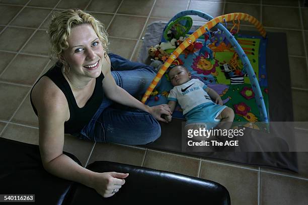 Australian basketballer Penny Taylor with her nephew, Luca, 9 November 2005. THE AGE SPORT Picture by WAYNE TAYLOR