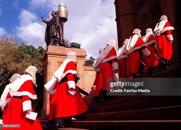 Supreme Court judges march in a procession to attend the Solemn Mass to mark the commencement of the 2003 Law Term at St. Mary's Cathedral in Sydney,...