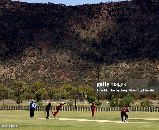 Indigenous teams from South Australia Play Queensland beneath the MacDonnell Ranges in Alice Springs for the Imparja Cup, 15 February 2007. SMH...