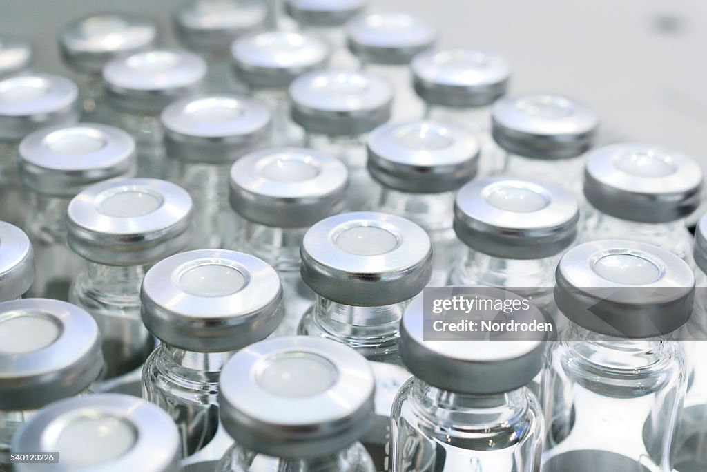 Glass vials for liquid samples.