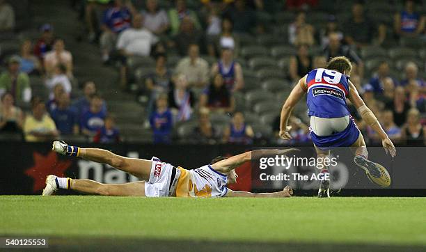 Cup, Round 2, Western Bulldogs V Brisbane at the Telstra Dome. Brisbane's Will Hamill grabs the pants off Bulldog's Shaun Higgins. 2nd March 2007....