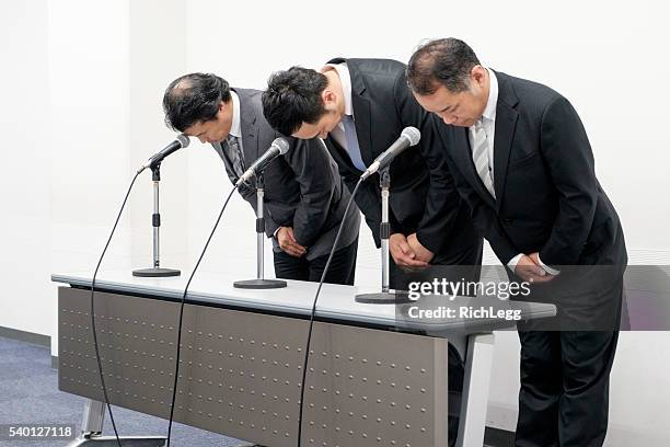 japanese business apology - japan press conference stock pictures, royalty-free photos & images