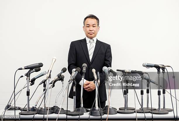 japanese business press conference - press conference microphones stock pictures, royalty-free photos & images