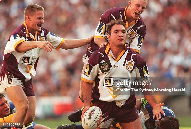 Brisbane Broncos player Gordon Tallis celebrates scoring a try in the rugby league grand final, 27 September 1998. SMH SPORT Picture by PAUL MILLER