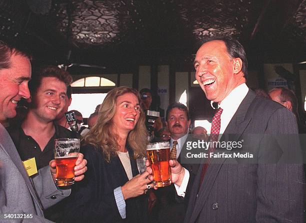Prime Minister Paul Keating, with his wife Annita Keating, share a laugh with locals at the Caledonia Hotel in Cessnock, 10 February 1996. NCH...